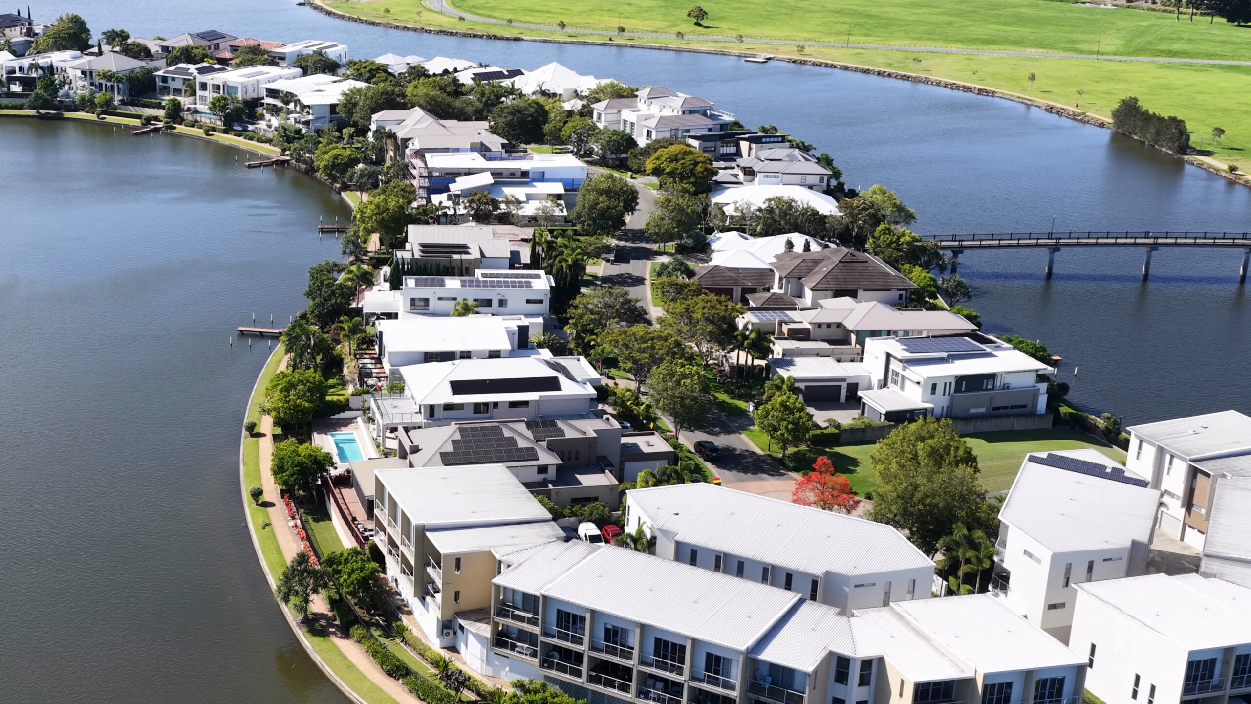 Aerial view of a modern Australian waterfront residential neighbourhood