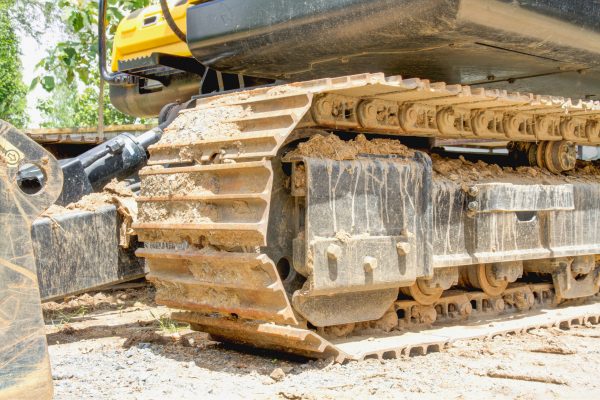 Crawler bulldozer machine during at construction site.