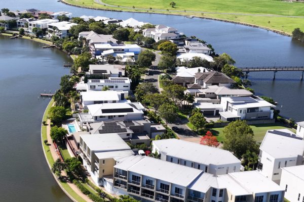 Aerial view of a modern Australian waterfront residential neighbourhood